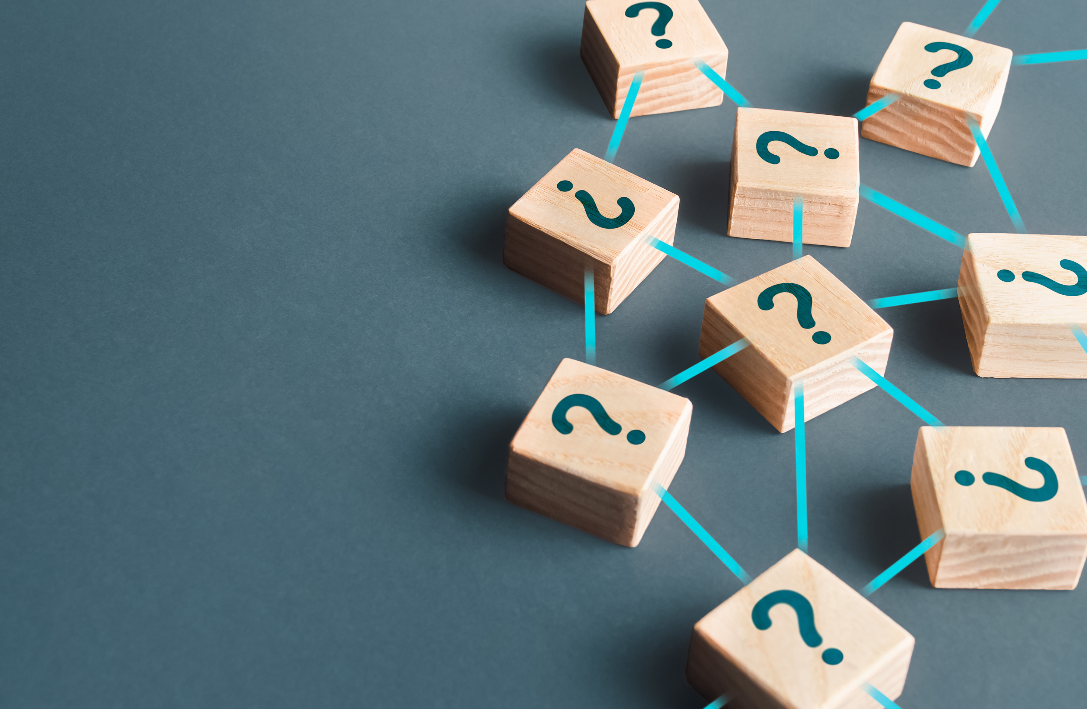 Image of question marks that are connected.